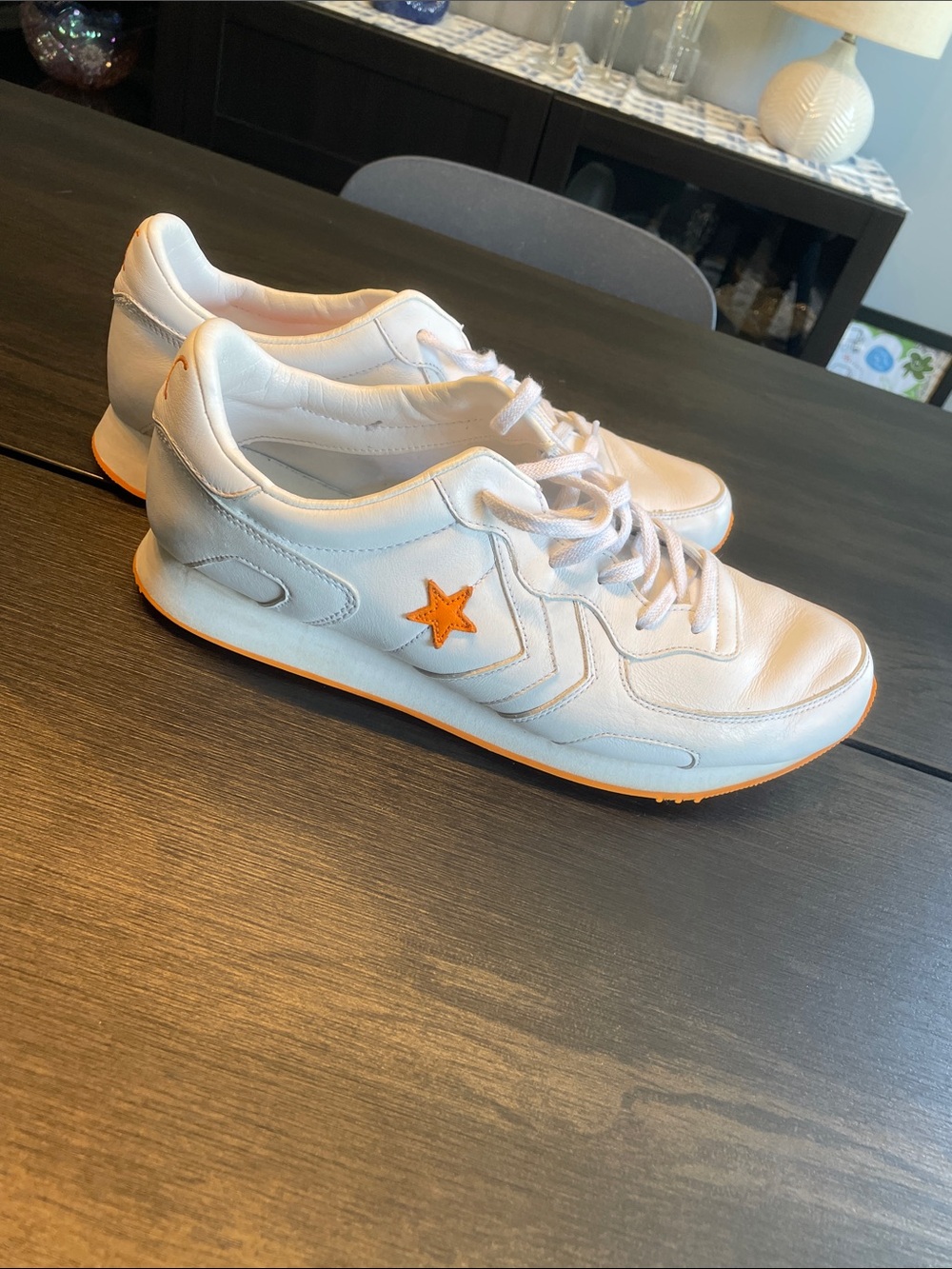 Converse X Illegal Industries White Sneakers with Orange Star and Sole Trim